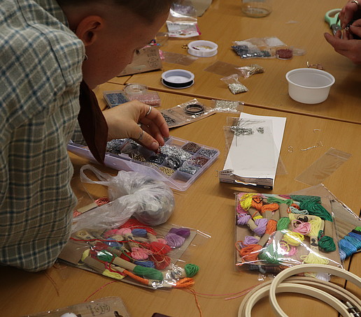 Craft materials such as embroidery thread on a table